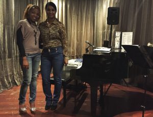 Betty Moreno and Monika Rodriguez play and sing for tourist crowds around Havana. 